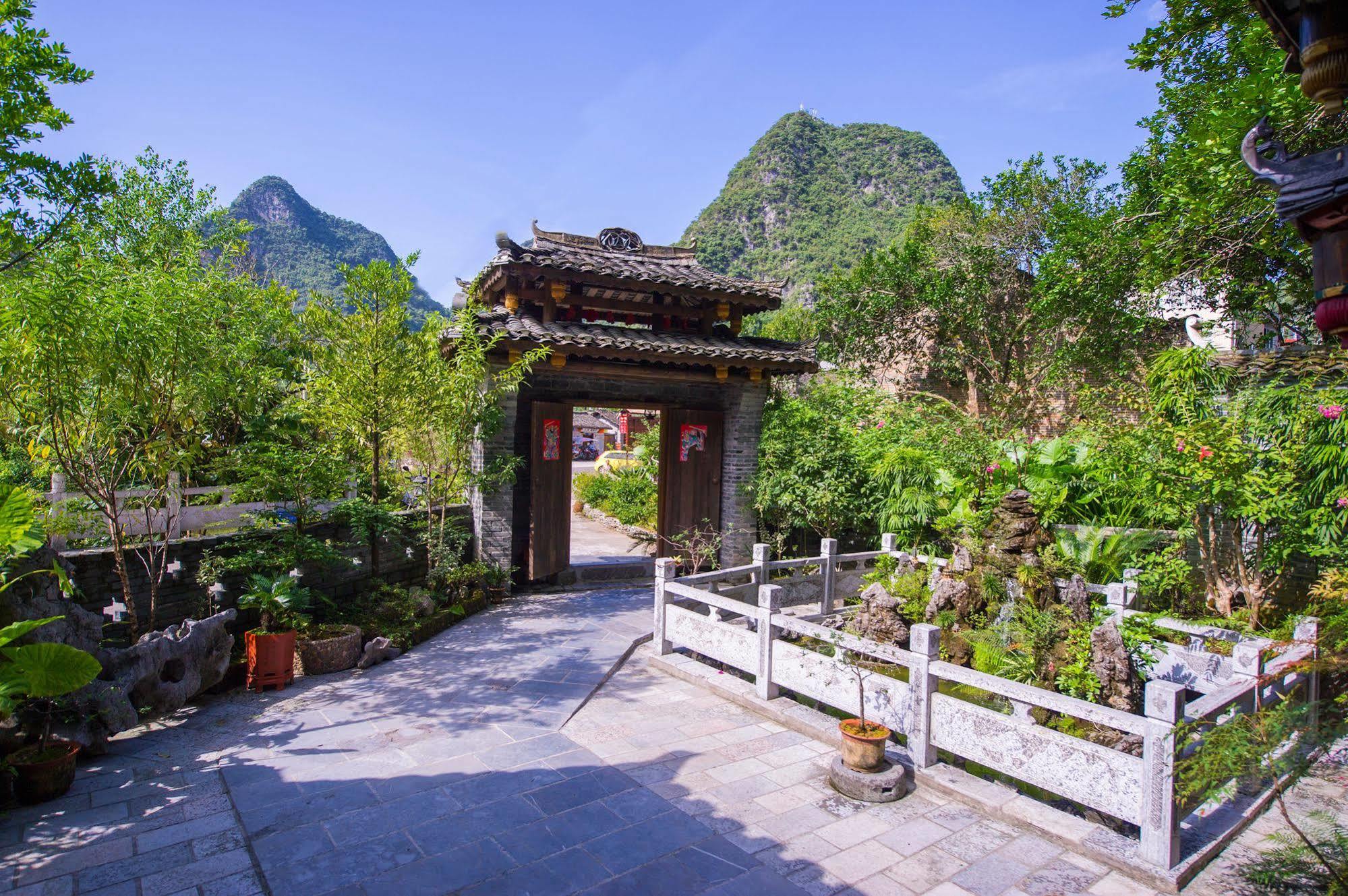 Отель Yangshuo Scenic Mountain Retreat Экстерьер фото