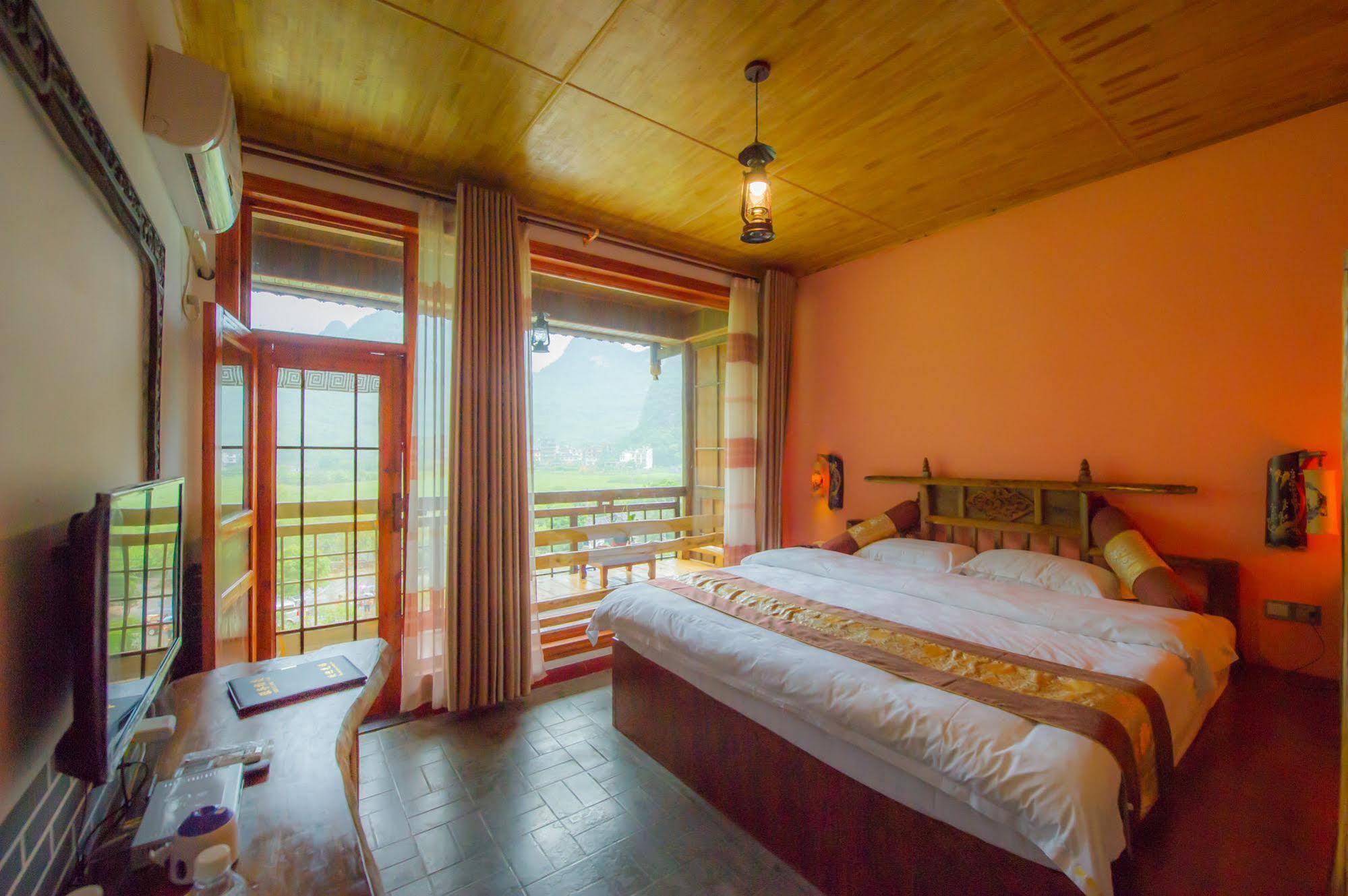 Отель Yangshuo Scenic Mountain Retreat Экстерьер фото